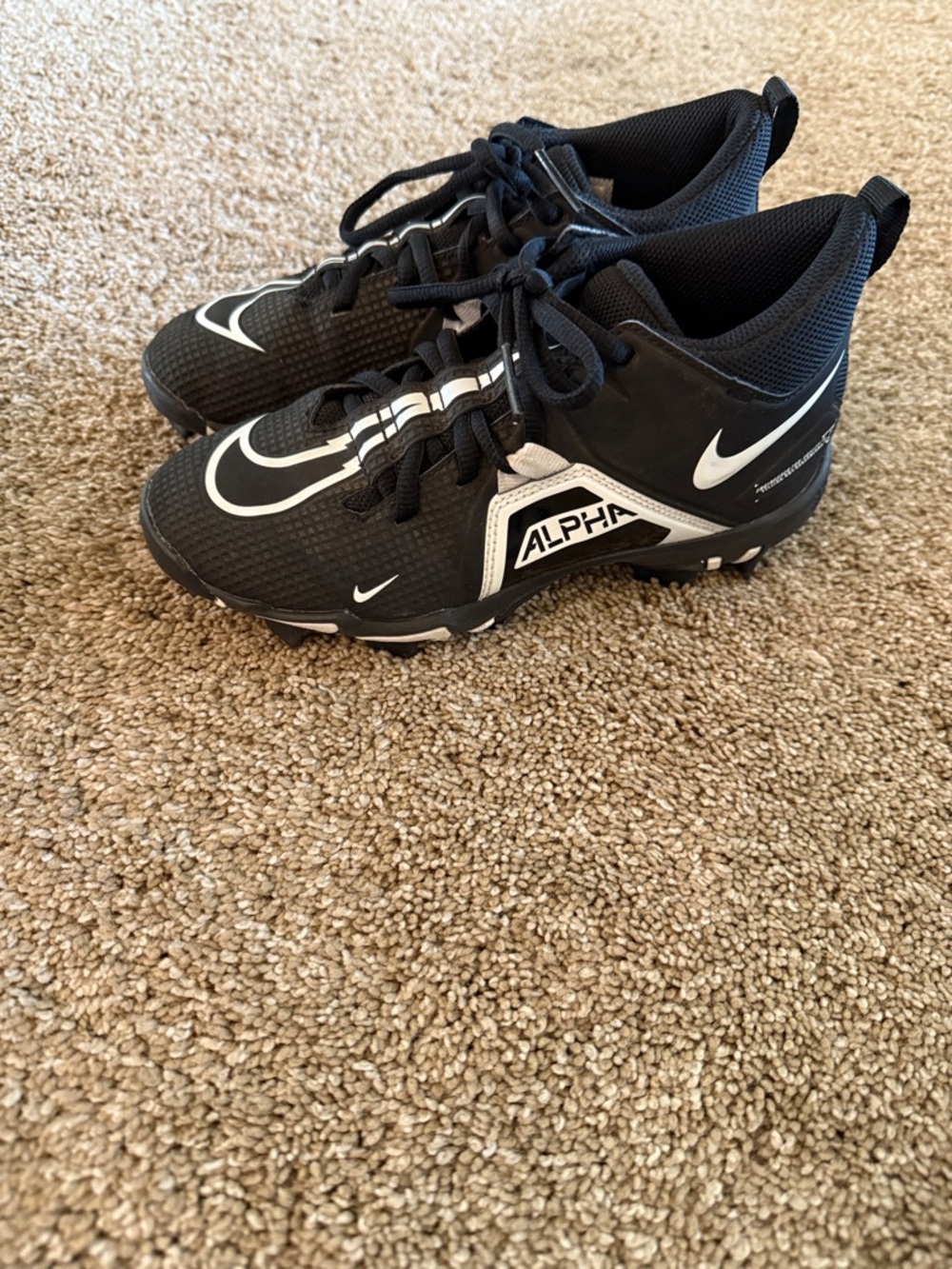 Nike Black and White Kids Alpha Cleats